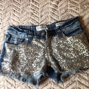 Buckle Daytrip size 24S sequined Capricorn shorts.